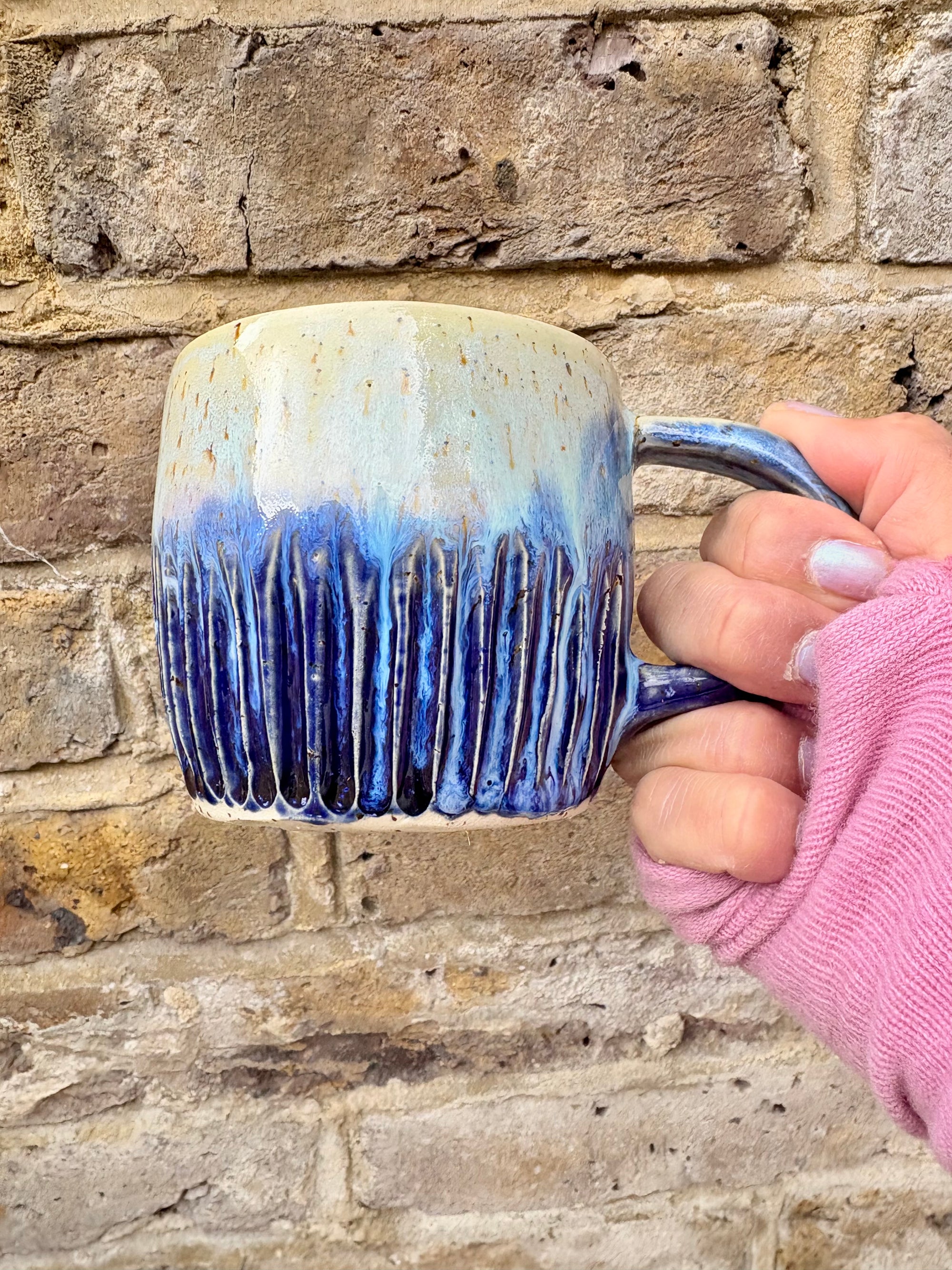 “A book a day keeps reality away" mug (blue night sky)