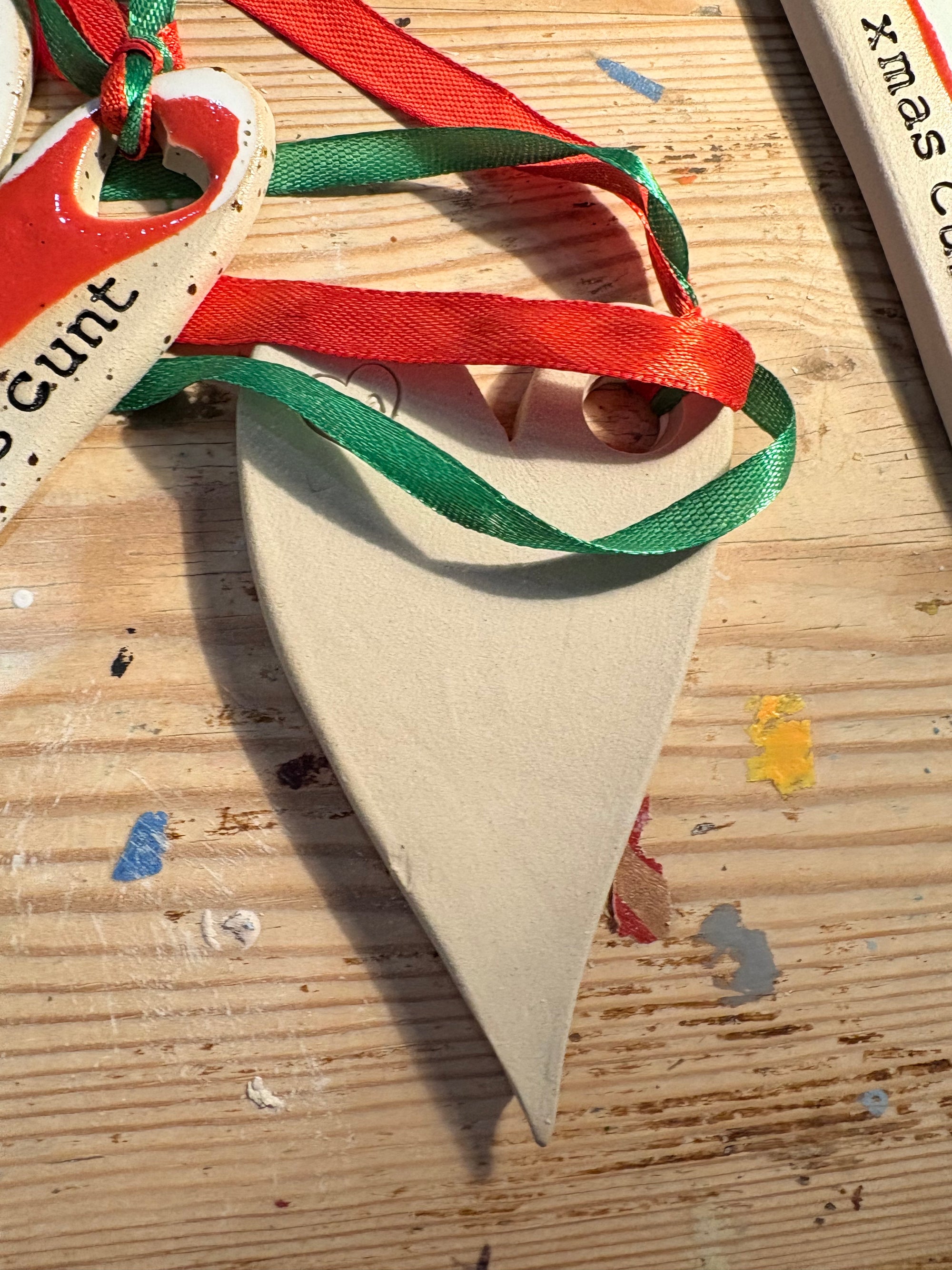 “merry xmas cunt” hanging decoration (red and white, large)