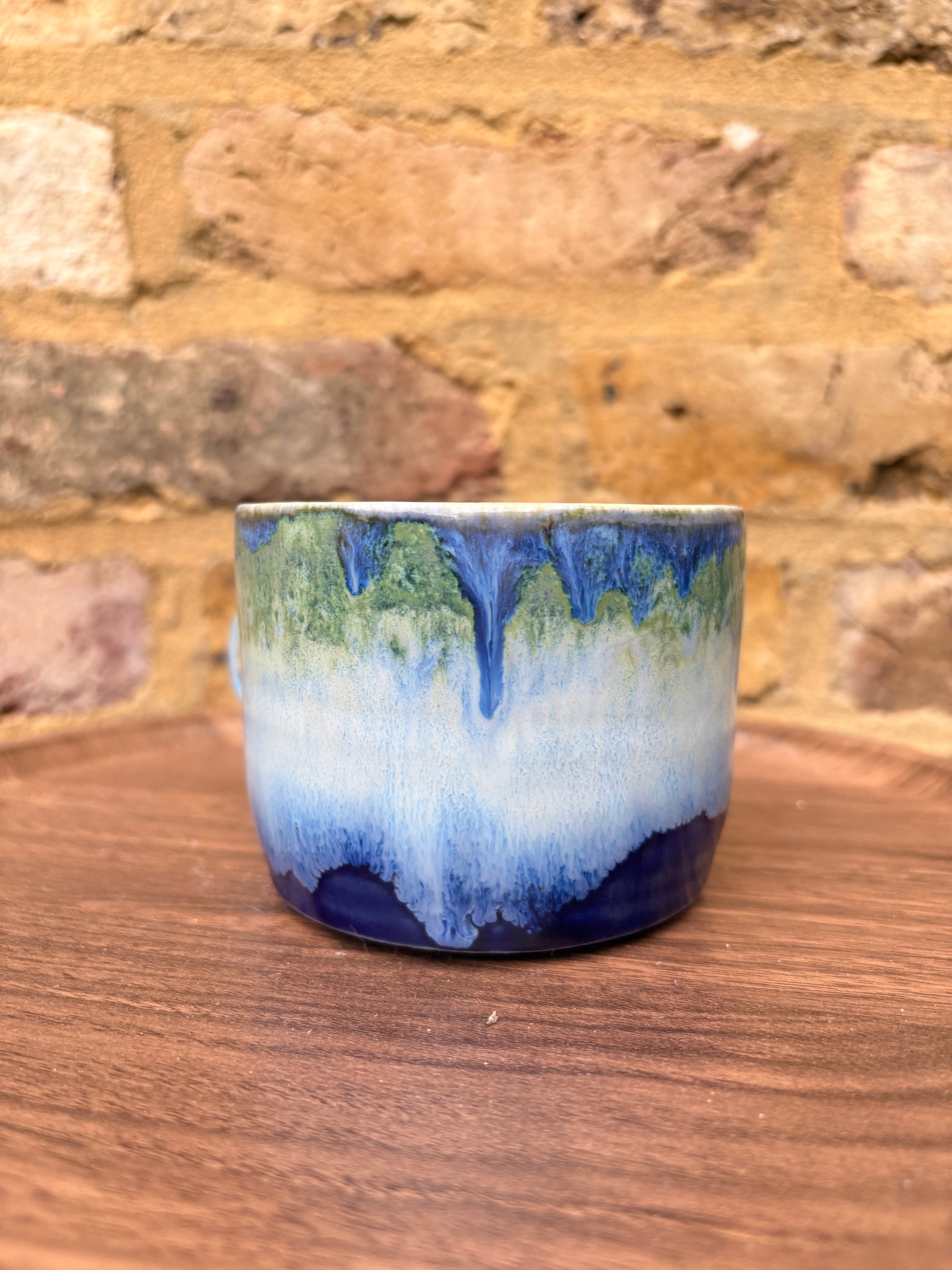 “What” “the fuck” mug (cream, blue/green)