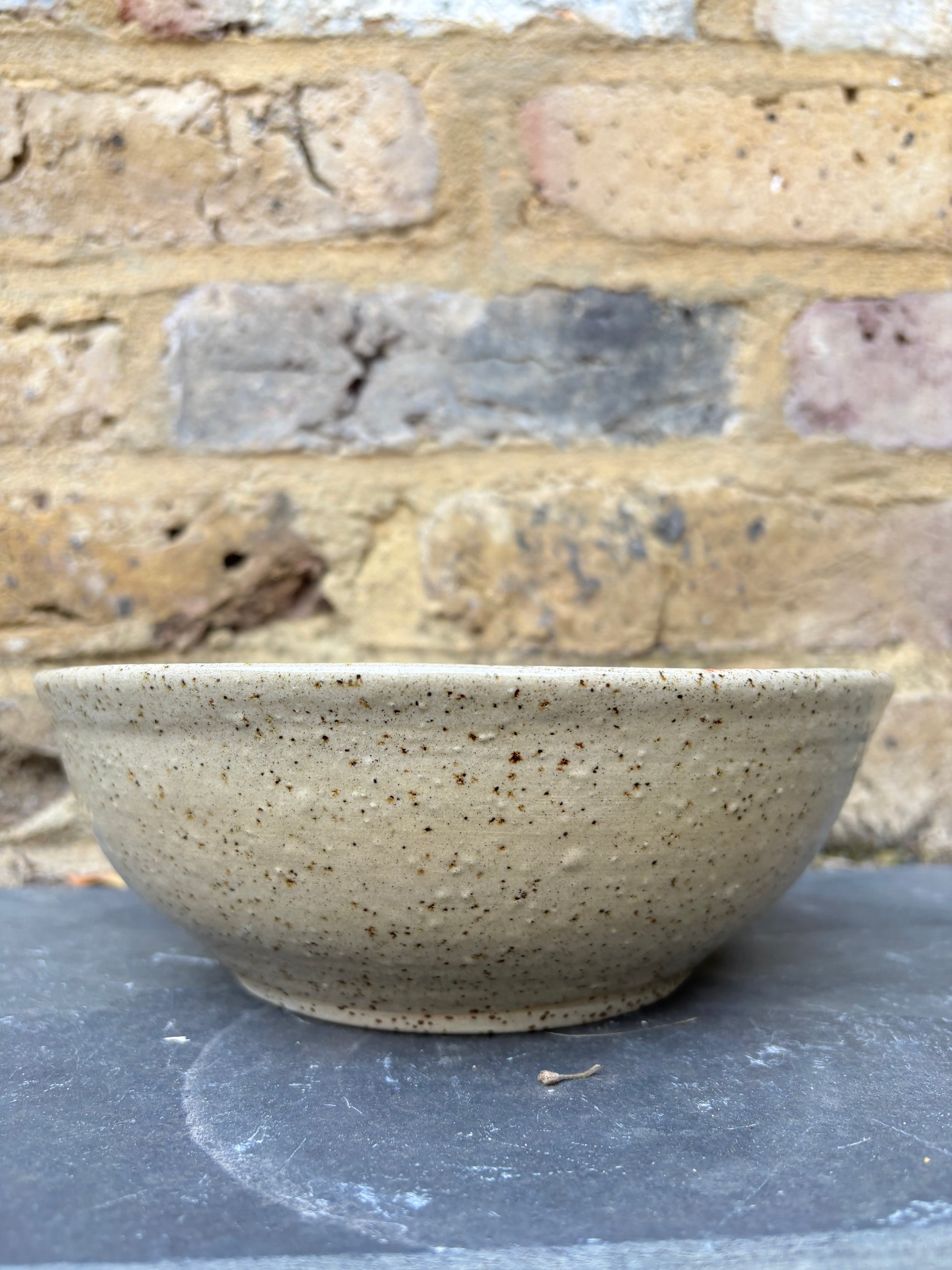 “eat, drink and fuck off by 9pm"  deep round salad/pasta bowl (pink, dark flecked clay)