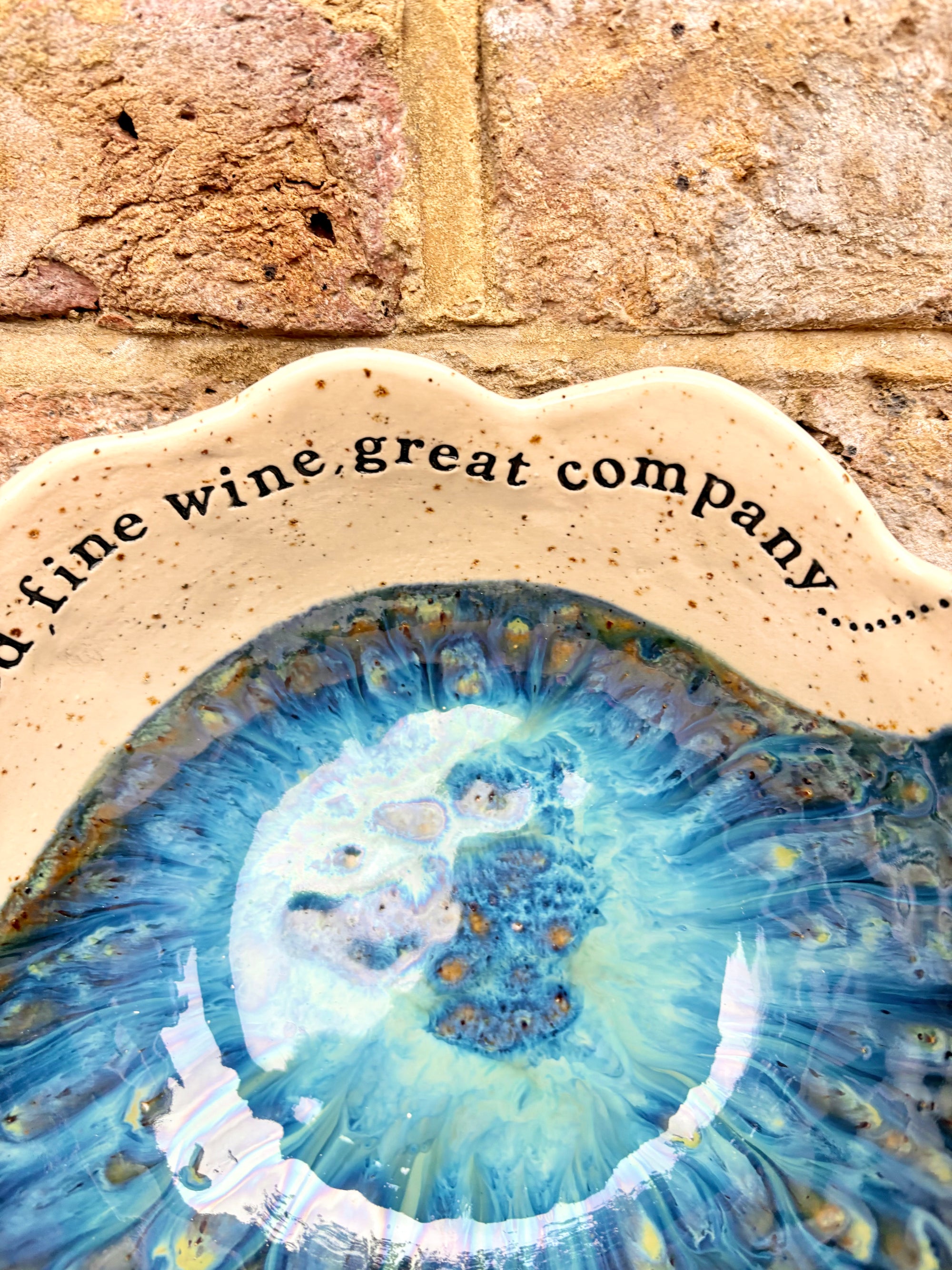 "good food, fine wine, great company..." deep salad/serving dish