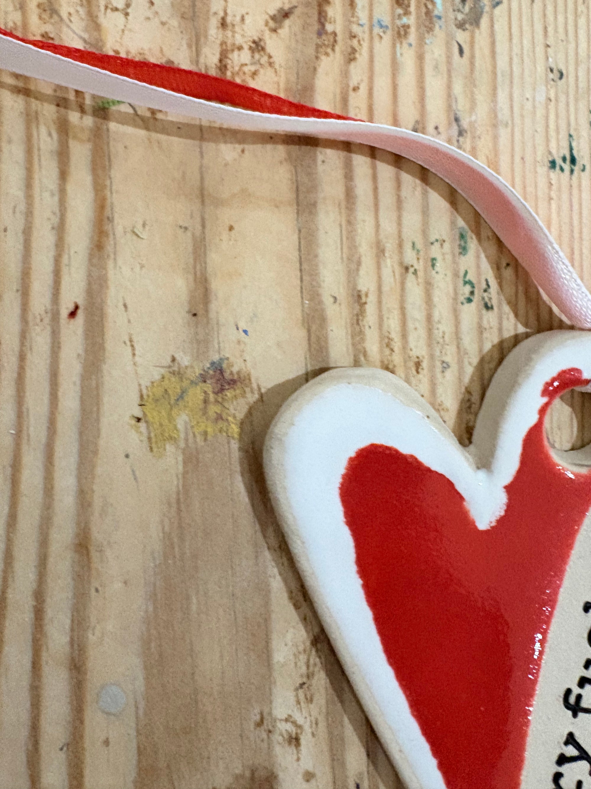 “merry fuckmas” hanging decoration (red and white, larger)