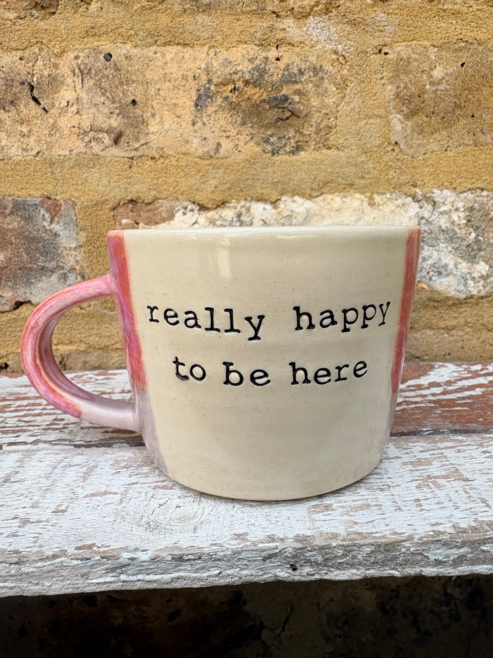 "really happy to be here” "what a bunch of cunts" mug (pink/lilac)
