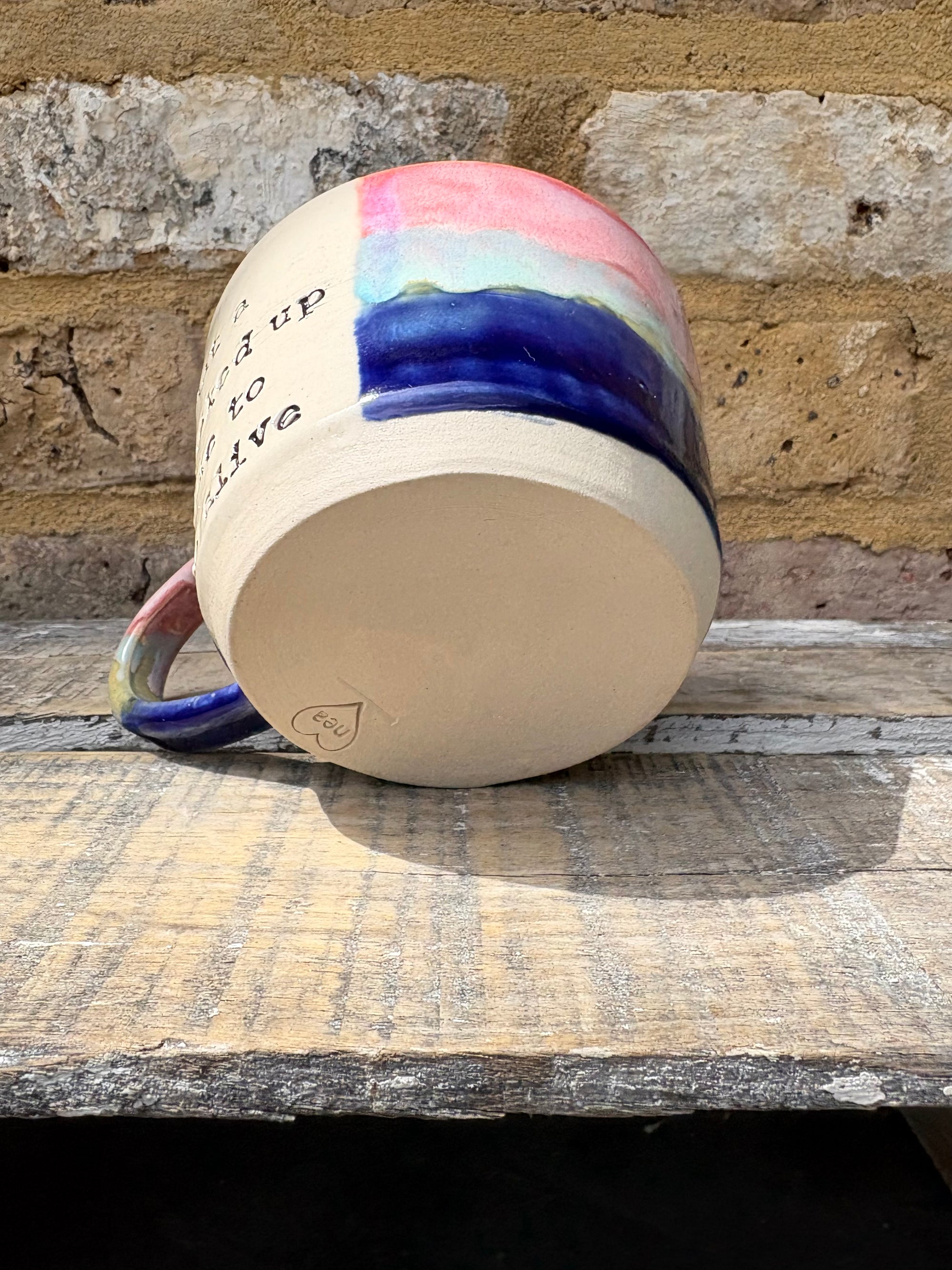 “what a fucked up time to be alive" mug (pink night sky)