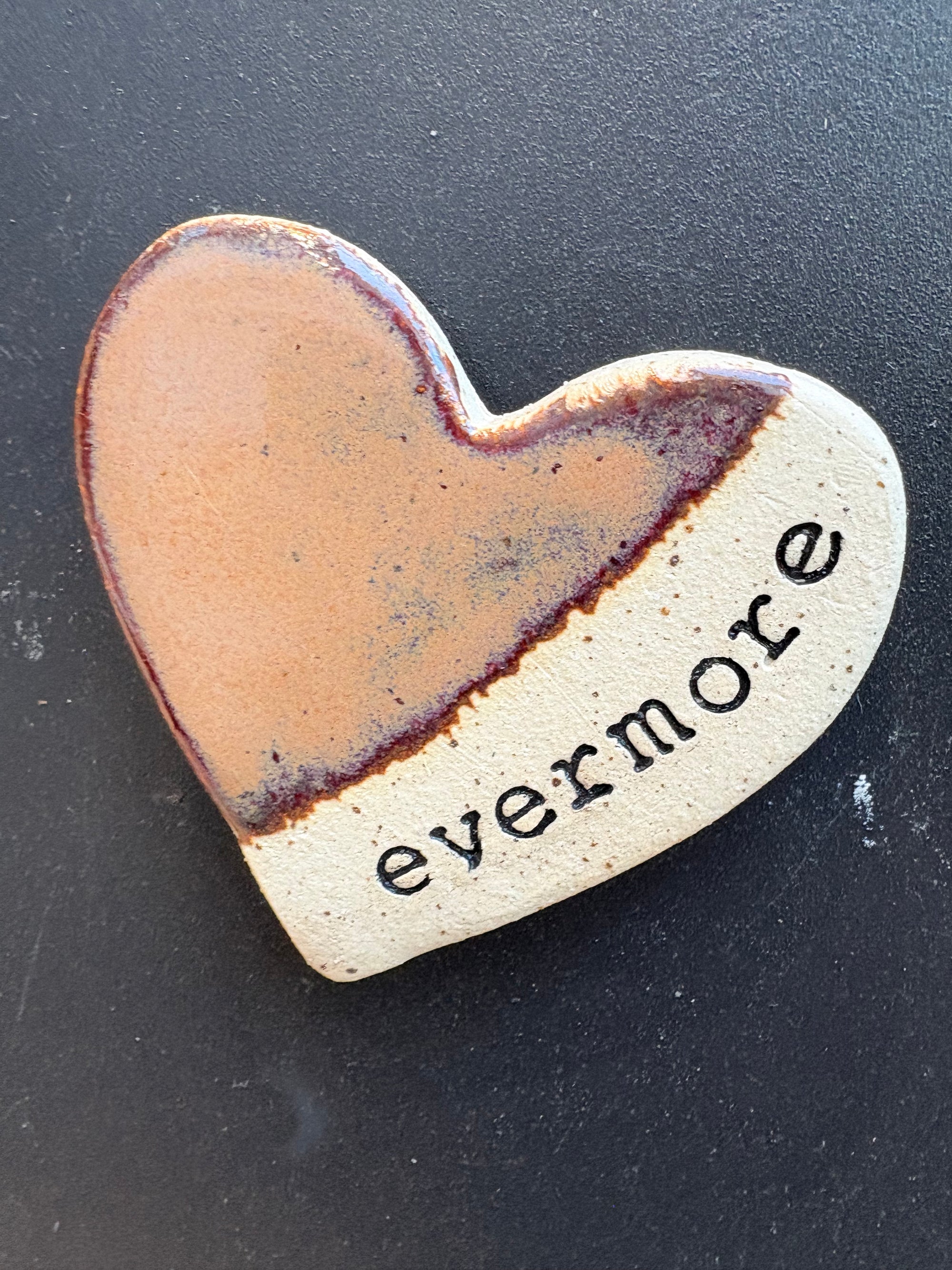 Twelve heart shaped Taylor Swift album magnets