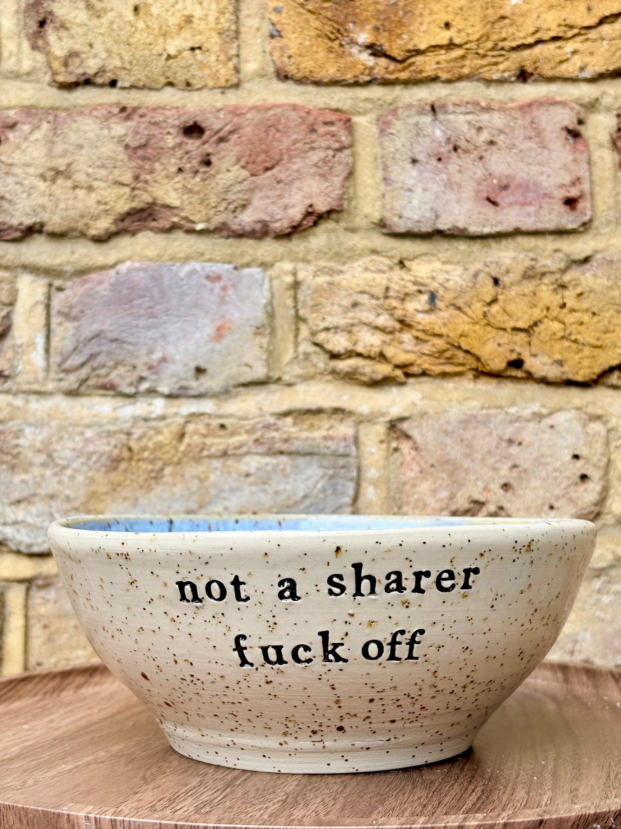 “not a sharer fuck off” deep round cereal bowl (blue, flecked clay)