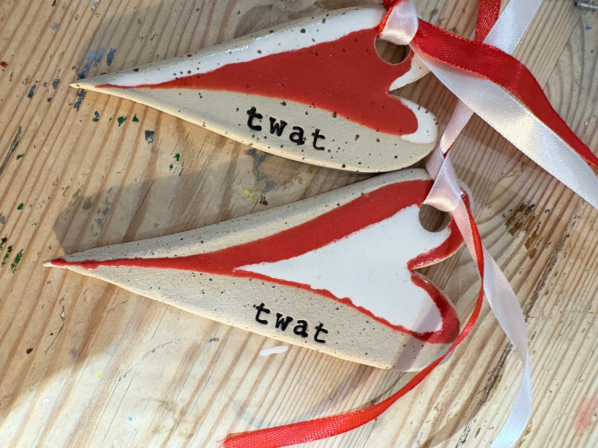 “twat” hanging decoration (red and white, large)