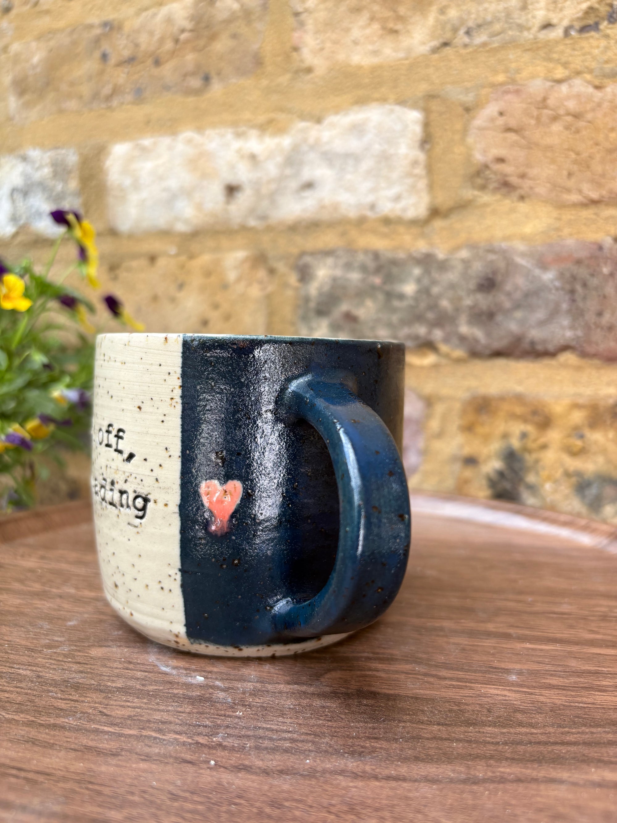 “Fuck off i'm reading" mug (blue/hearts)