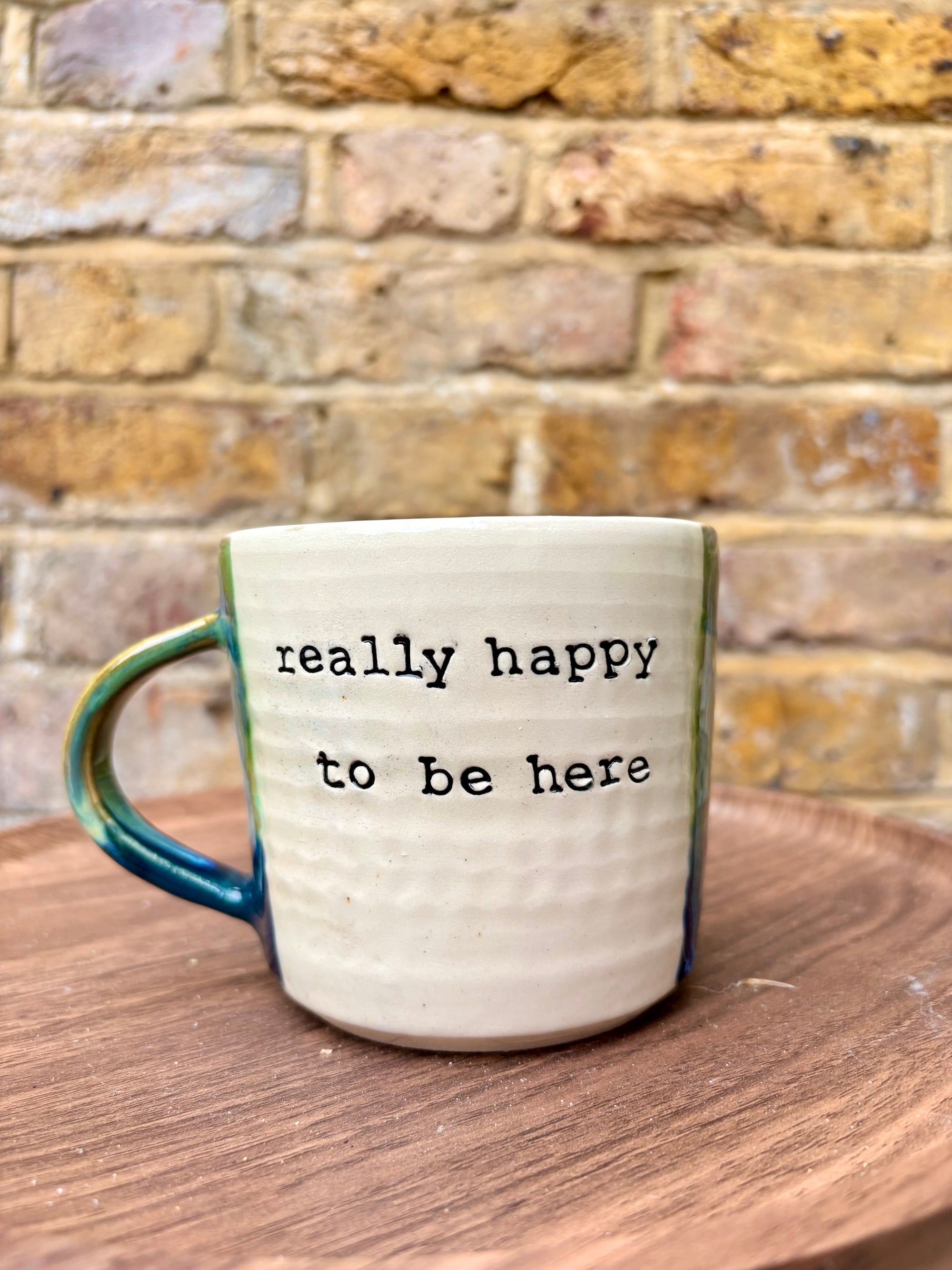 "really happy to be here” "what a bunch of cunts" mug (greens)